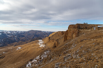 Layered rocks in the sunset rays. Plateau Bergamet