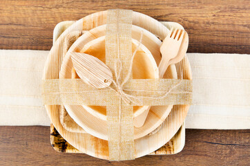 Kitchenware made from dried betel nut leaf palm, natural material.