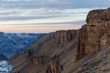 Layered rocks in the sunset rays. Plateau Bergamet