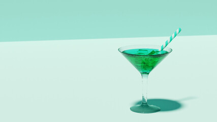 Cocktail vert dans un verre à pied.