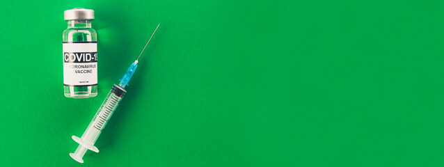 Covid-19 coronavirus vaccine and syringe