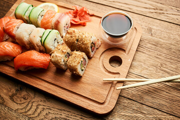 wooden board sushi rolls japanese cuisine sea food