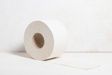 Roll of toilet paper on wooden background, natural, ecological