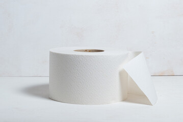 Roll of toilet paper on wooden background, natural, ecological