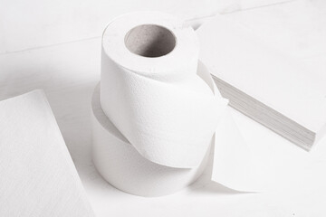 Roll of toilet paper on wooden background, natural, ecological