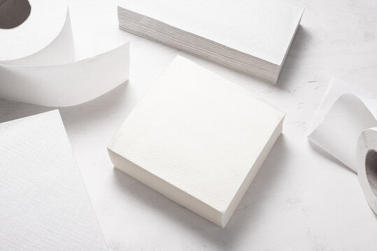 Set of different paper hand towels on wooden desk
