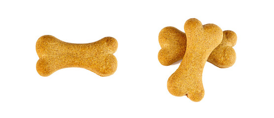 Top view of crunchy brown bone shaped dog biscuit as a treat set isolated on white background close up.