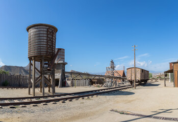 View of a typical old west railways scenario, on the Oasys - Mini Hollywood, Spanish Western-styled theme park, Western scenario, traditional stores, Alméria Taberna desert