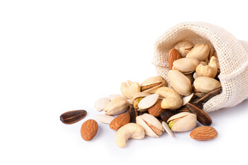 Mix organic nuts with almond, pistachio, cashew, pumpkin seeds and sunflower seed in sack bag isolated on white background 