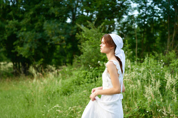 Fototapeta na wymiar woman outdoors in garden countryside ecology nature
