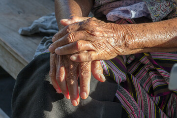 hands of the elderly person