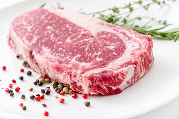 Close up beef rib eye steak isolated on white
