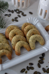 home made german crescent christmas cookies with pumpkin seeds