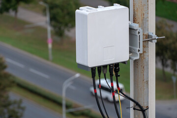 telecommunication equipment cellular station on tower. Macro Base Station. 5G radio network telecommunication equipment with radio modules and smart antennas. Dangerous radiation from 5G networks