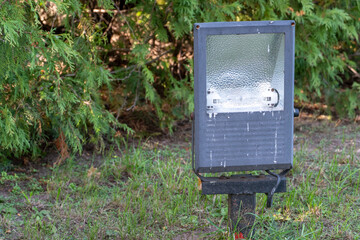 A small decorative lantern in the garden. Lighting of the infield. Electric street lighting.
