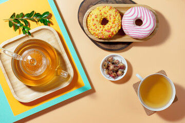 Tea with dessert on a bright colored background