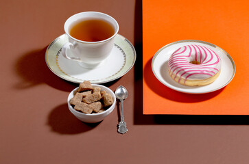 Tea with dessert on a bright colored background