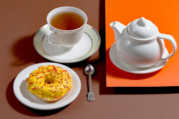 Tea with dessert on a bright colored background