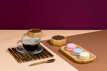 Obraz na płótnie Canvas Coffee with dessert on a bright colored 