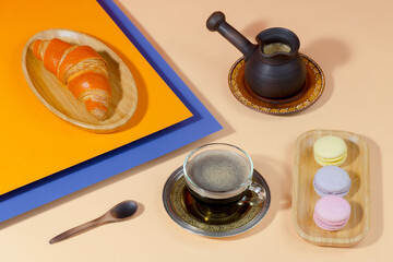 Coffee with dessert on a bright colored 