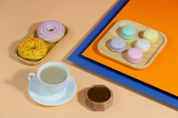 Coffee with dessert on a bright colored 