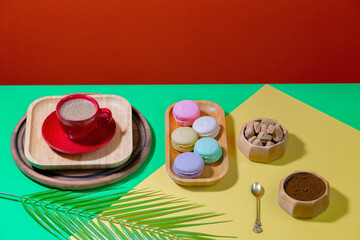 Coffee with dessert on a bright colored 