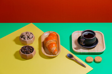Coffee with dessert on a bright colored 