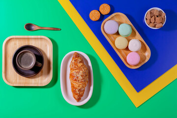 Coffee with dessert on a bright colored 