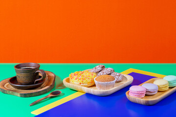 Coffee with dessert on a bright colored 