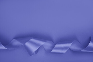 Curly violet ribbon background