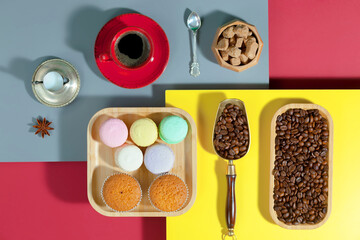 Fototapeta na wymiar Coffee with dessert on a bright colored 