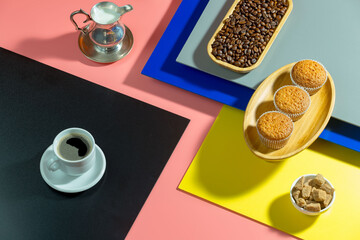 Obraz na płótnie Canvas Coffee with dessert on a bright colored background 