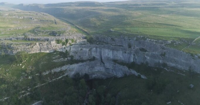 Aerial shot of Malham cove in Yorkshire Dales