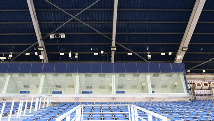 Empty vip glass room on grandstand in stadium.	
