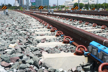 Steel railway with clip lock connection on concrete sleepers.	