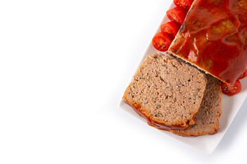 Traditional American meatloaf with ketchup isolated on white background. Top view. Copy space	