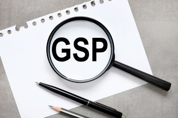 GSP. text inside a black magnifier on a gray background