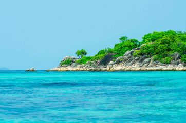 Natural stone doors in the Andaman Sea, Thailand, clean and pure water, suitable for relaxation, swimming, diving, watching the underwater world in summer