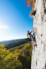 Fototapeta premium girl rock climber