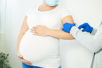 a pregnant woman is given a vaccine