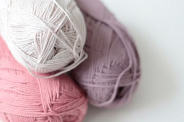 purple, red and white cotton yarn