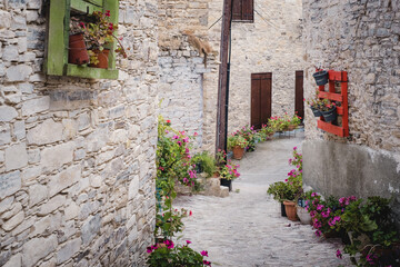 Fototapeta na wymiar Cozy narrow street in the village of Pano Lefkara. Larnaca District, Cyprus.