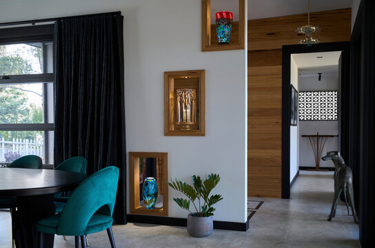 Dining room with dog statue at home