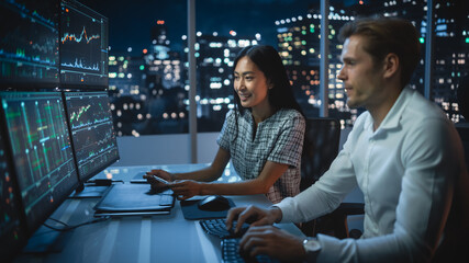 Financial Analyst Talking to Investment Banker in Late Evening at Work. Chatting About Real-Time...