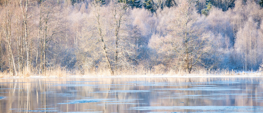 River in a cold winter landscape with snow and frost © Conny Sjostrom