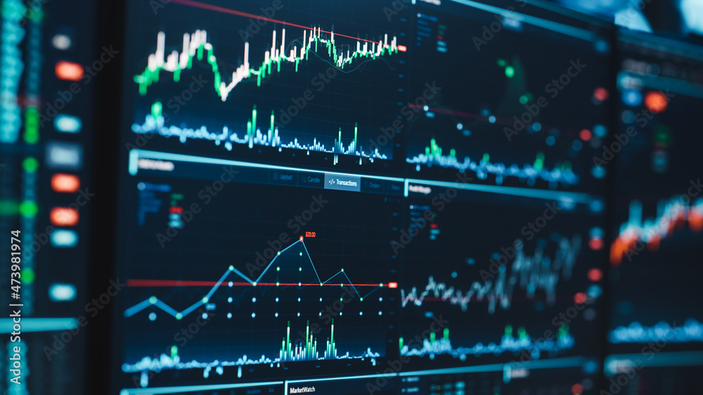 Poster close up footage of a computer monitor screen with real-time stocks, commodities and exchange market