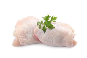 Raw chicken thighs with parsley on white background © New Africa