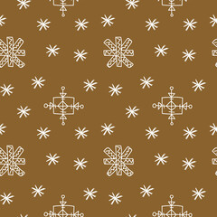 Seamless vector pattern with white snowflake illustrations on a kraft background.Winter,Christmas hand drawn doodle style print.Designs for textiles,fabric,wrapping paper,packages,scrapbooking paper.