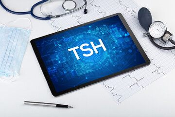 Close-up view of a tablet pc with medical abbreviation