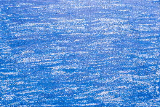 Blue crayon drawings on the white paper background texture. blue paint background drawing texture.